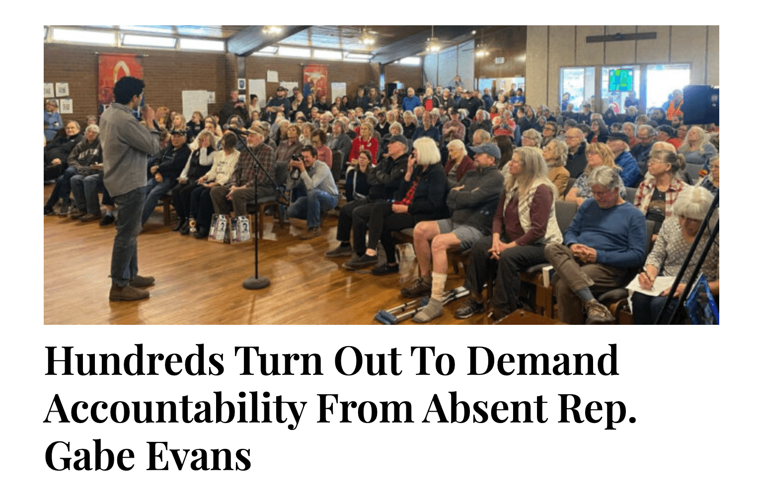 Screenshot: Yellowscene Magazine. “Hundreds Turn Out To Demand Accountability From Absent Rep. Gabe Evans,” 3/22/2025