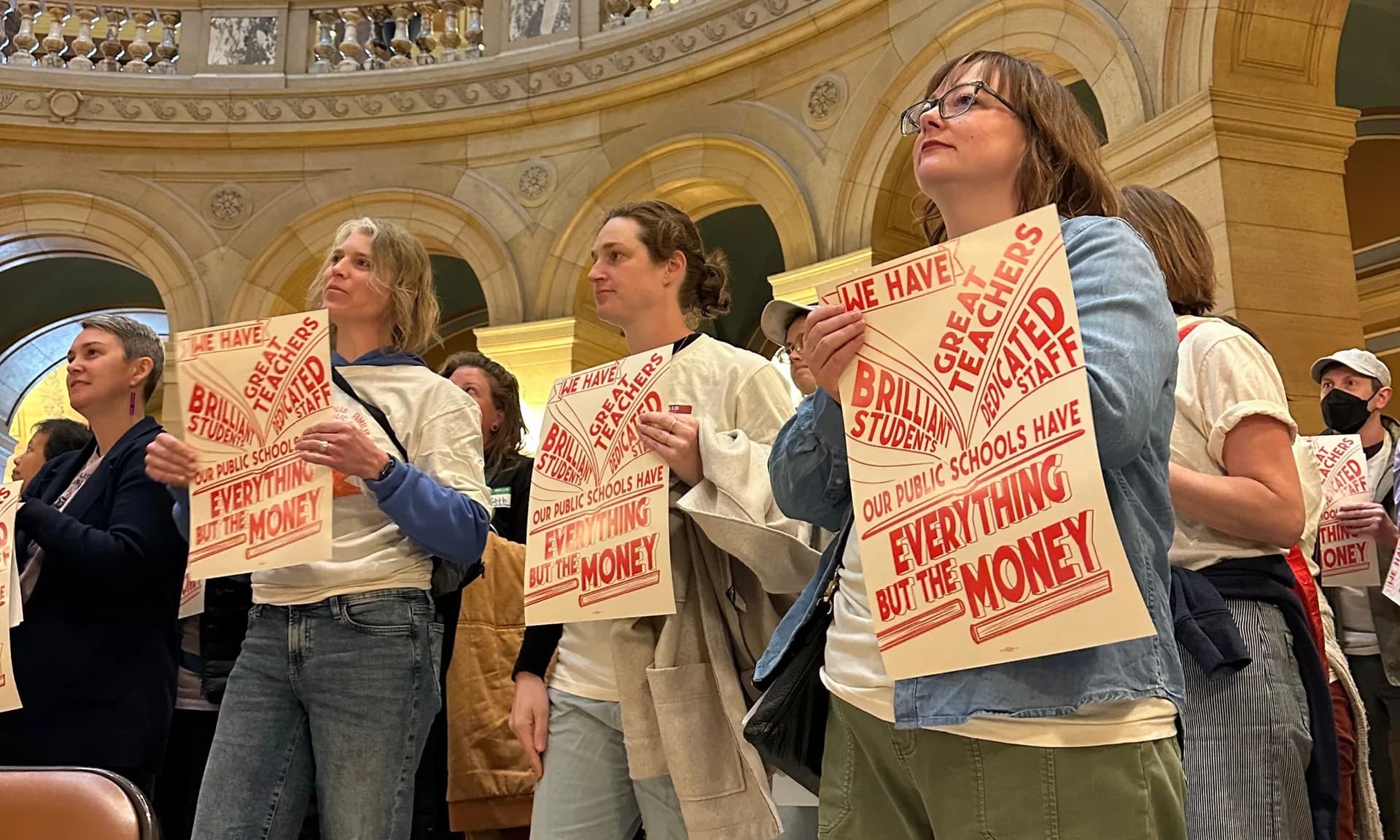 Photo: TakeAction Minnesota parents with Minnesota Families for Public Schools rally in the State Capitol rotunda.