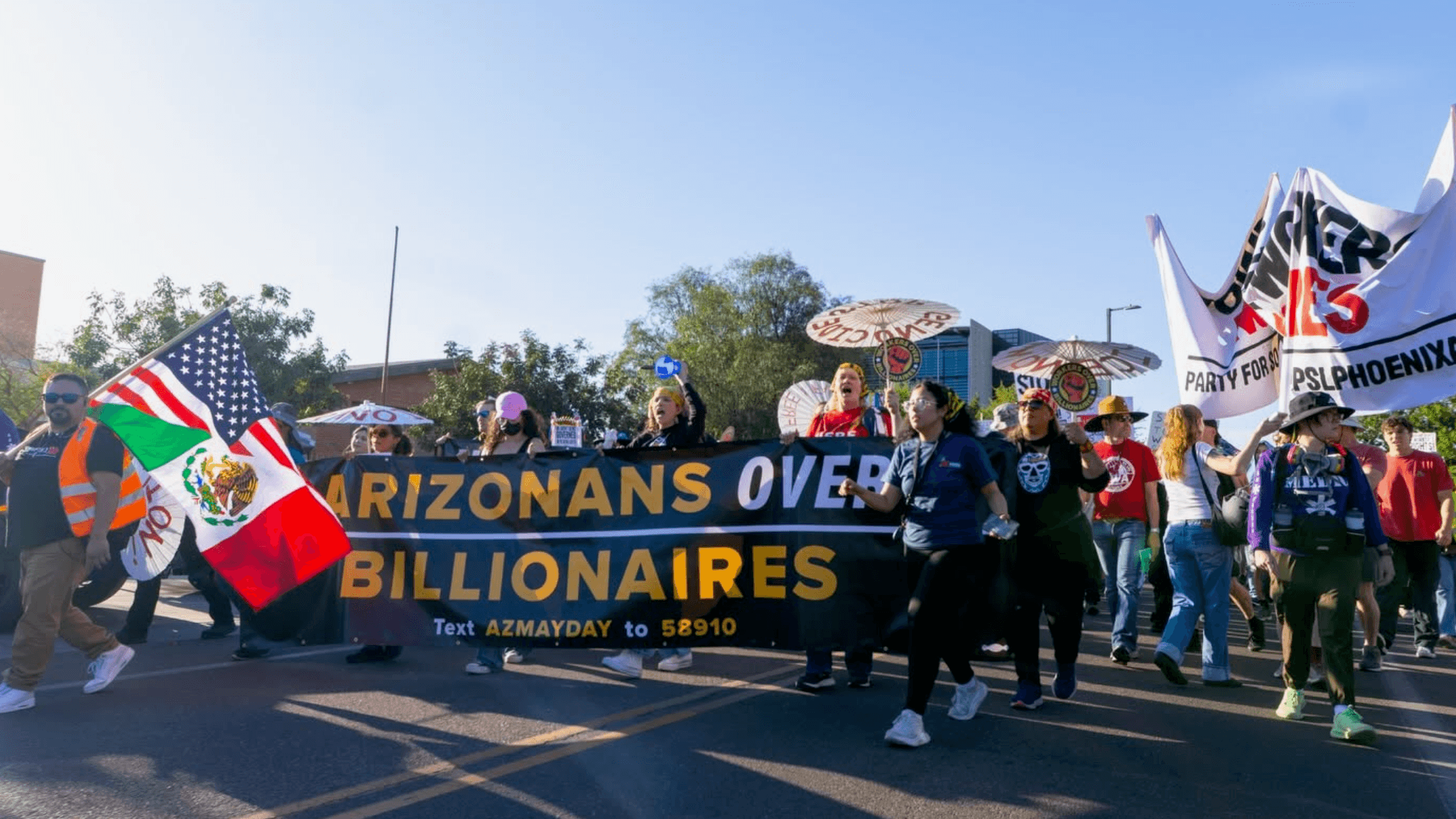 Photo: LUCHA and their members marching on May Day to demand “Arizonans Over Billionaires.”