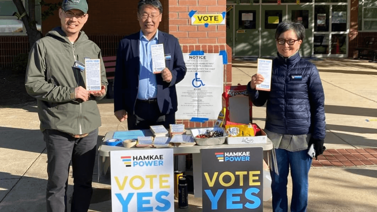 Photo: Hamkae Power, NAKASEC Action Fund’s Virginia Chapter, persuading voters on Election Day to support Virginia’s redistricting ballot measure.
